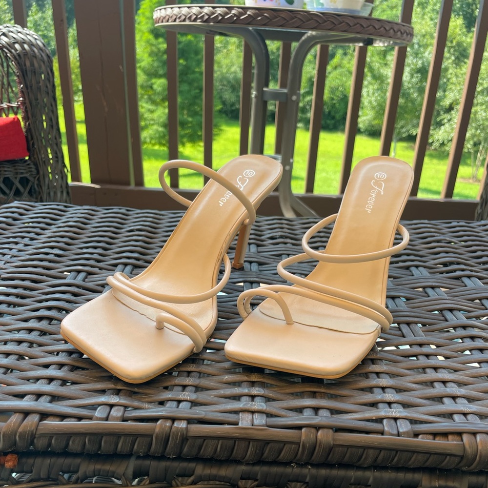 Nude strappy toe heels